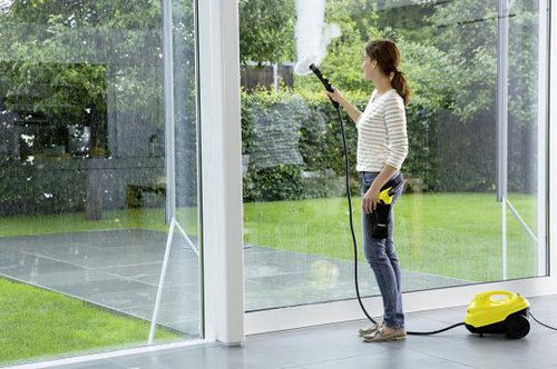  Cleaning the windows with a steam cleaner